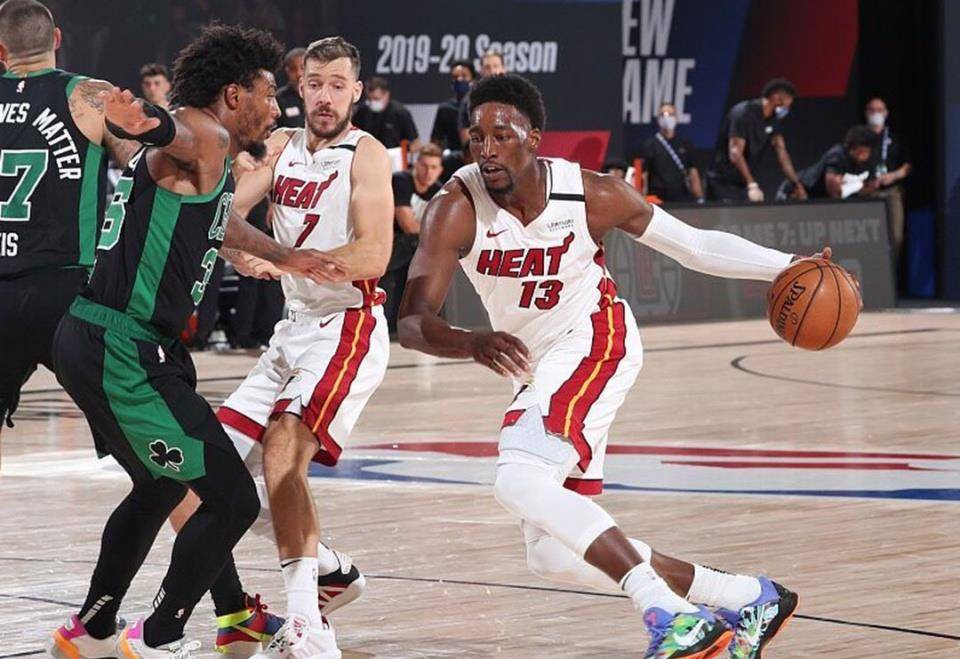  巴特勒关键抢断热火加时险胜猛龙守住季后赛区